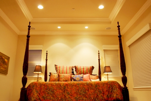 General and task recessed lighting in a bedroom