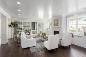 Recessed lights in a wood ceiling in a nice living room